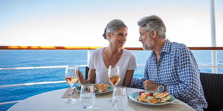 Lifestyle - Couple dining on balcony, 2023